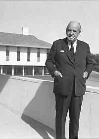 Edward Durell Stone in front of residence hall