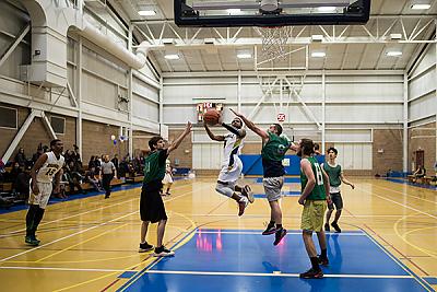 Landmark College students playing basketball in Click Center