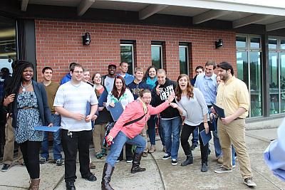 Group of students holding awards