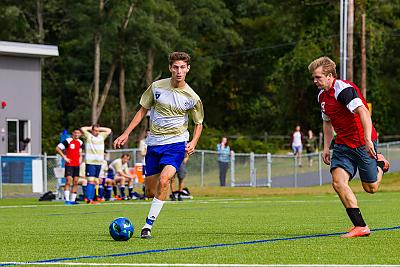 Landmark College soccer player moves the ball